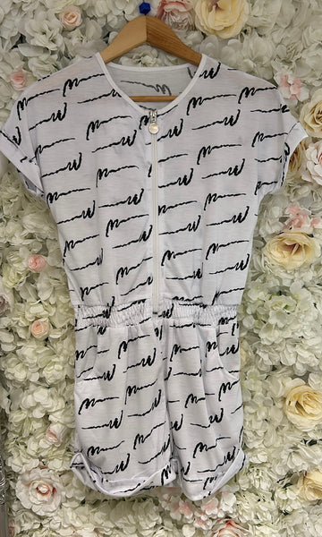 White and black playsuit