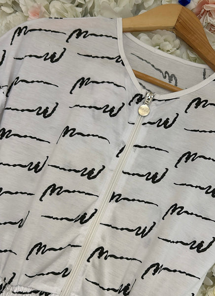 White and black playsuit
