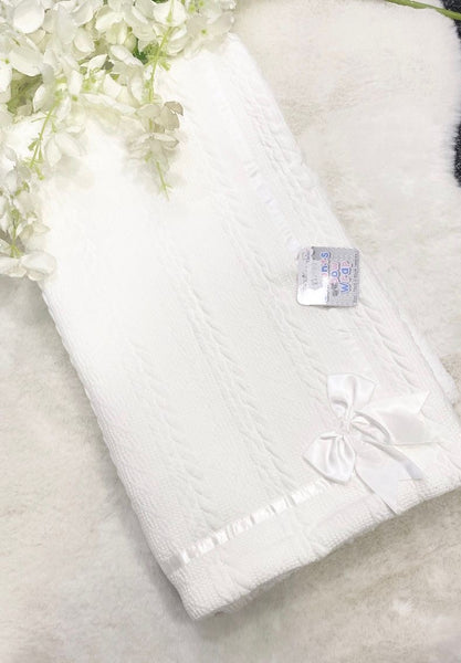 White blanket with bow