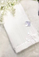 White blanket with bow