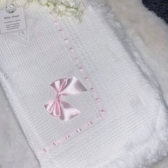 White and pink baby shawl