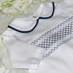 White & navy smocked romper