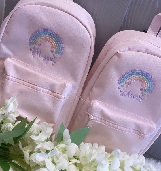 Regular pink rainbow personalised backpack
