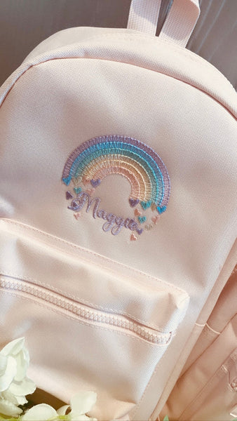 Regular pink rainbow personalised backpack