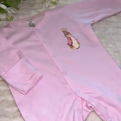 Pink romper Peter rabbit design