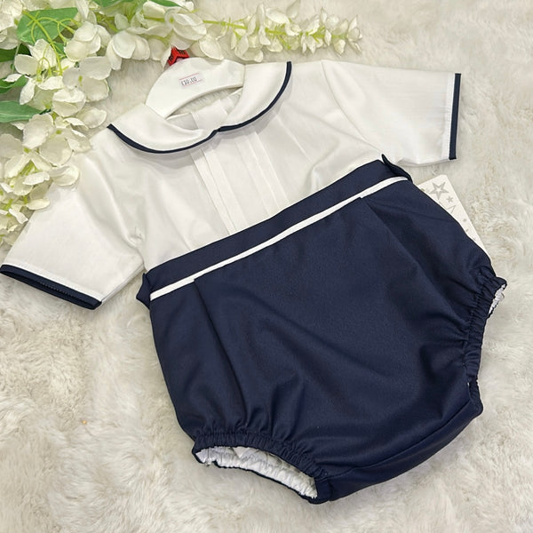 White Shirt and Navy Shorts