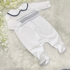 White & navy smocked romper