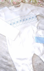 Little dreams smocked sleepsuit and hat in white and blue