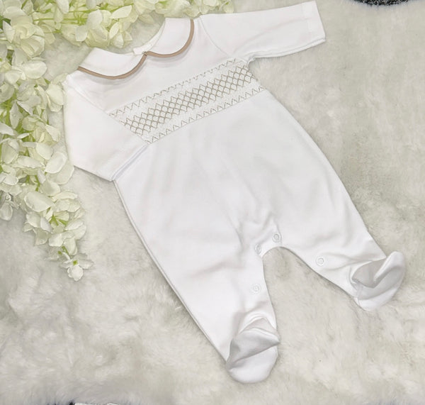 White and beige smocked romper