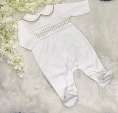 White and beige smocked romper