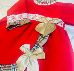 Red dress with Burberry trim and bows