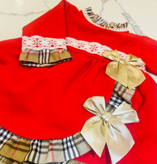 Red dress with Burberry trim and bows