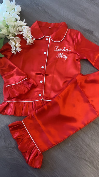 Girls red silky pjs with frill trim