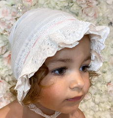 Pink and white lace detailed bonnet