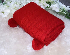 Red cable knit blanket