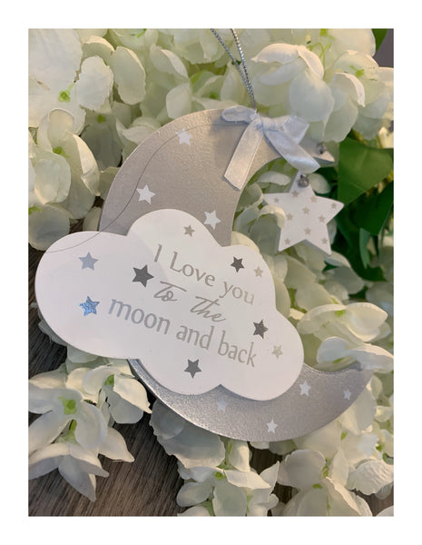 “I love you to the moon and back” hanging plaque