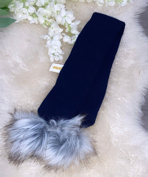 Navy blue knitted scarf with grey pom